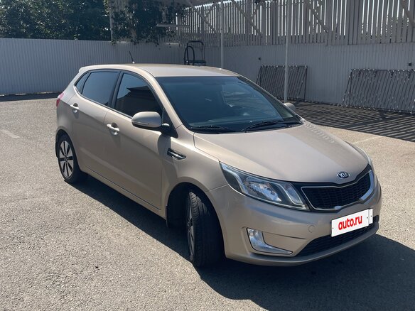 2013 Kia Rio 4-speed III, бежевый, 1020000 рублей - вид 9