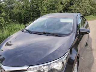 2015 Toyota Corolla XI (E160, E170, E180), серый, 1250000 рублей, вид 2