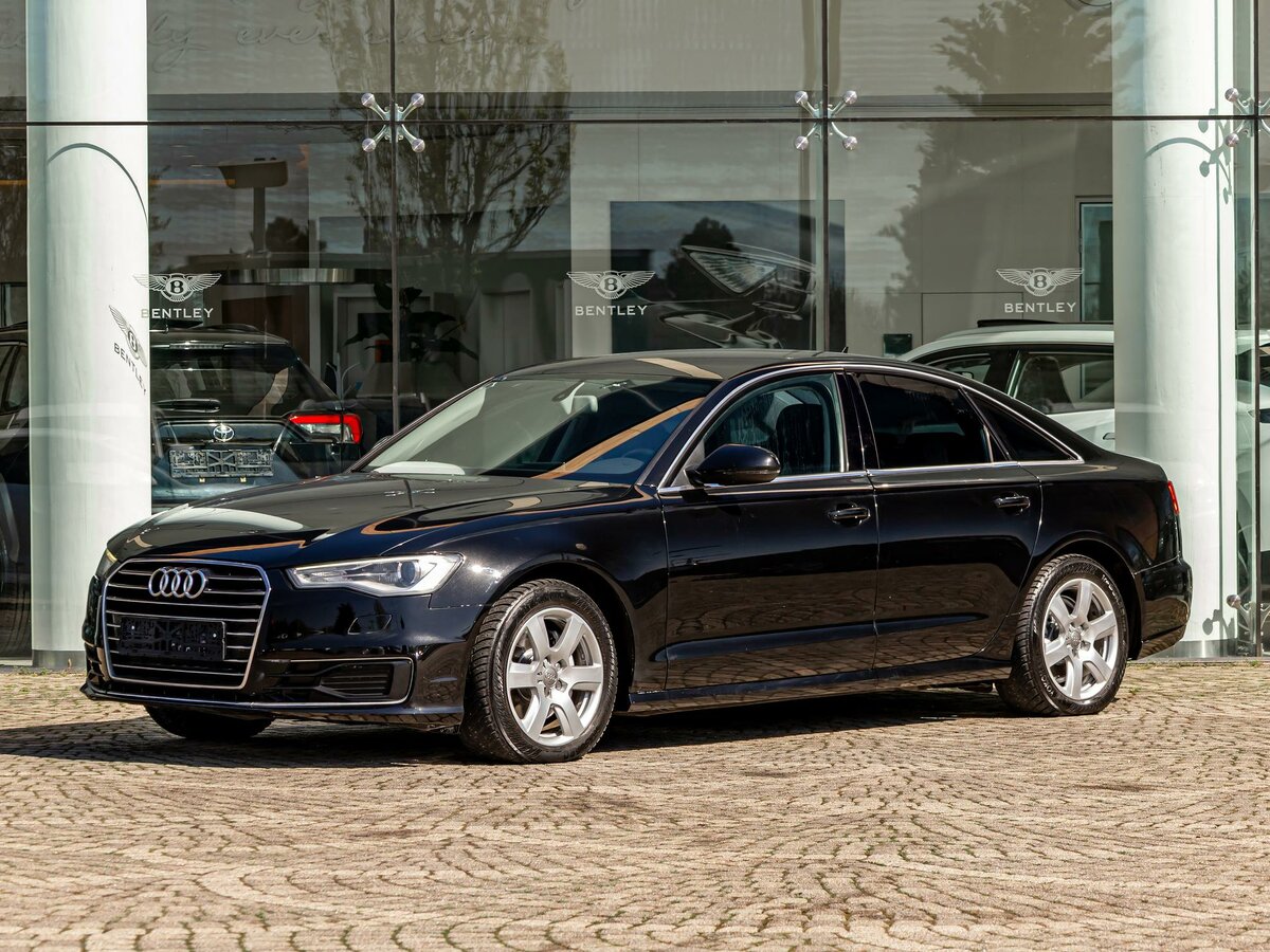 Открыть фотографии: Audi A6 IV (C7) Рестайлинг