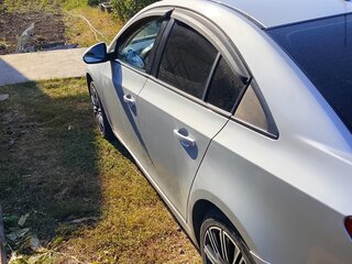 2014 Chevrolet Cruze I Рестайлинг, серебристый, 690000 рублей, вид 4