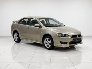 2008 Mitsubishi Lancer X, бежевый, 699000 рублей, вид 1