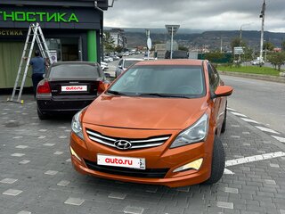2015 Hyundai Solaris I Рестайлинг, оранжевый, 670000 рублей, вид 2