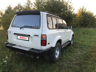 1995 Toyota Land Cruiser 80 Series Рестайлинг, белый, 2700000 рублей, вид 1