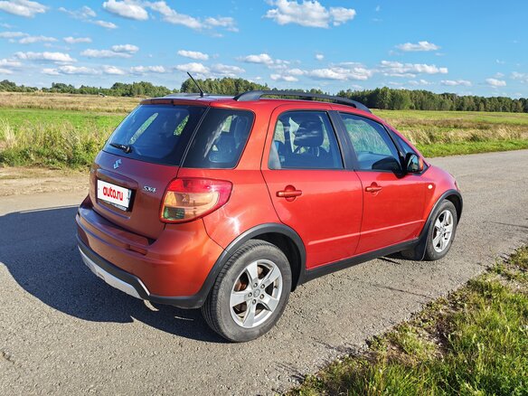 2010 Suzuki SX4 I (Classic) Рестайлинг, оранжевый - вид 3
