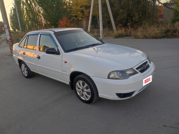2011 Daewoo Nexia I Рестайлинг, белый, 299000 рублей - вид 1