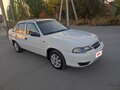 2011 Daewoo Nexia I Рестайлинг, белый, 299000 рублей - вид 1