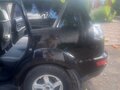 2010 Mitsubishi Outlander II Рестайлинг, чёрный, 1050000 рублей - вид 8