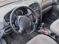 2005 Hyundai Santa Fe I, пурпурный - вид 7