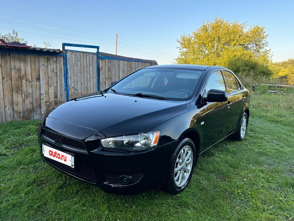 2010 Mitsubishi Lancer X, чёрный, 685000 рублей