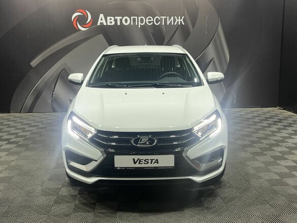 2026 Lada (ВАЗ) Vesta SW I Рестайлинг (NG), белый, 1815000 рублей - вид 1