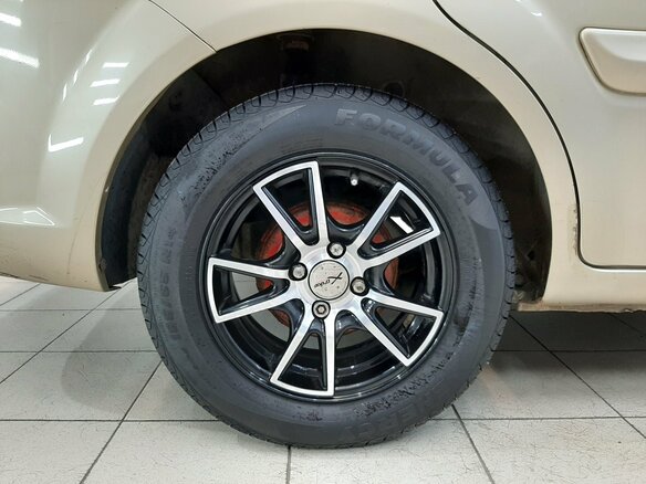 2011 Kia Rio II Рестайлинг, бежевый - вид 12