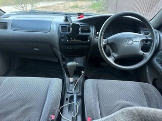 1998 Toyota Corolla VII (E100), синий, 220000 рублей, вид 3