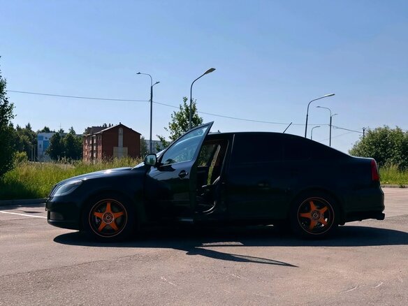 2012 Skoda Octavia II (A5) Рестайлинг, чёрный, 825000 рублей - вид 1