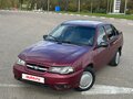 2011 Daewoo Nexia I Рестайлинг, пурпурный