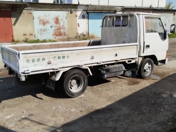 1990 Mitsubishi Minicab, белый - вид 5