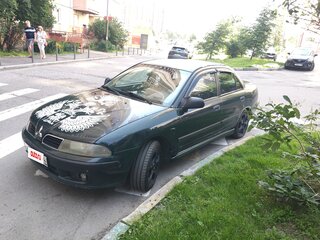 2001 Mitsubishi Carisma I Рестайлинг, зелёный, 180000 рублей, вид 1