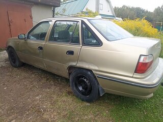 2006 Daewoo Nexia I, жёлтый, 79000 рублей, вид 4