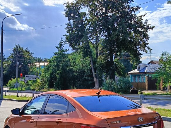 2014 Hyundai Solaris I Рестайлинг, оранжевый - вид 12