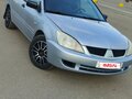 2007 Mitsubishi Lancer IX Рестайлинг, серебристый, 690000 рублей