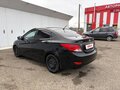 2013 Hyundai Solaris I, чёрный, 750000 рублей - вид 3