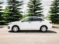 2026 Lada (ВАЗ) Vesta CNG I Рестайлинг (NG), белый - вид 7