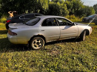 1992 Toyota Sprinter Marino, серебристый, 170000 рублей, вид 2