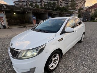 2012 Kia Rio 4-speed III, белый, 650000 рублей, вид 5