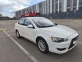 2010 Mitsubishi Lancer X, белый, 750000 рублей - вид 2