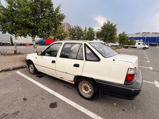 2002 Daewoo Nexia I, бежевый, 170000 рублей, вид 5