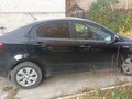 2015 Kia Rio III, чёрный, 1095000 рублей - вид 1