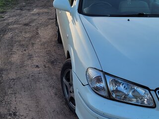 2001 Nissan Bluebird Sylphy I (G10), белый, 310000 рублей, вид 2