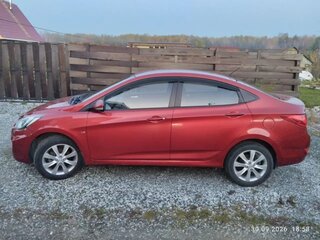 2012 Hyundai Solaris I, красный, 750000 рублей, вид 4