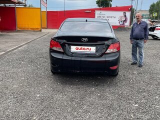 2013 Hyundai Solaris I, чёрный, 410000 рублей, вид 3