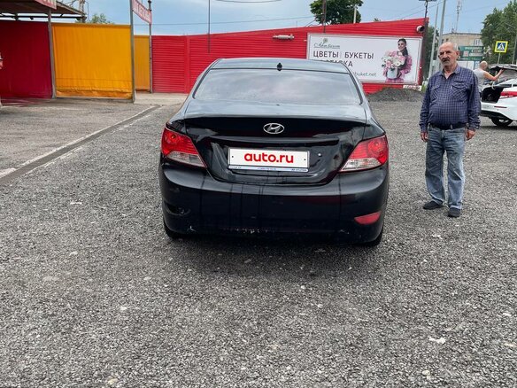 2013 Hyundai Solaris I, чёрный, 410000 рублей - вид 2