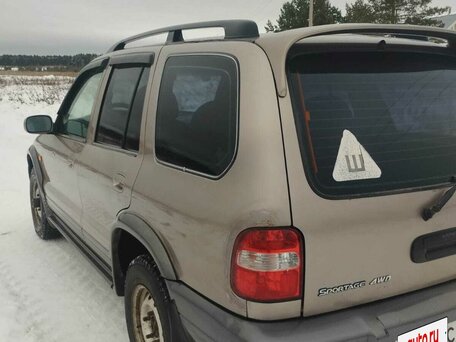 2005 Kia Sportage Grand I, коричневый, 370000 рублей, вид 5