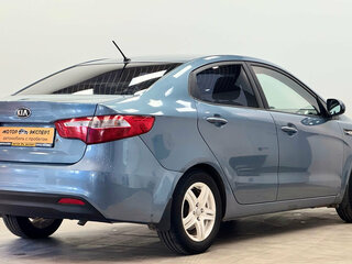 2013 Kia Rio III, синий, 560000 рублей, вид 4