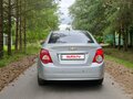 2012 Chevrolet Aveo II, серебристый, 255000 рублей - вид 4