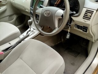 2010 Toyota Corolla Axio X (E140, E150) Рестайлинг, золотистый, 770000 рублей, вид 5