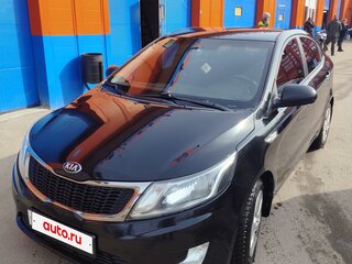 2014 Kia Rio 6-speed III, чёрный, 850000 рублей, вид 1