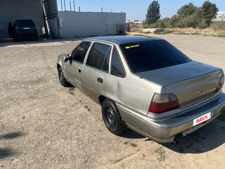2001 Daewoo Nexia I, коричневый, 95000 рублей, вид 5