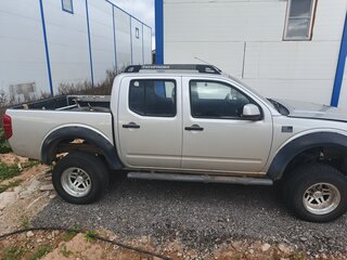 2010 Nissan Navara (Frontier) III (D40) Рестайлинг, серебристый, 580000 рублей, вид 3
