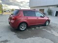 2006 Nissan Tiida I, красный - вид 4