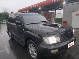 2003 Toyota Land Cruiser 100 Series Рестайлинг 1, чёрный, 1480000 рублей, вид 3