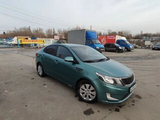 2012 Kia Rio 5-speed III, зелёный, 693150 рублей, вид 4