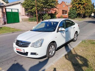 2014 Nissan Almera III (G15), белый, 850000 рублей, вид 1