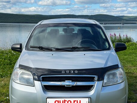 2011 Chevrolet Aveo I Рестайлинг, серебристый, 400000 рублей, вид 2