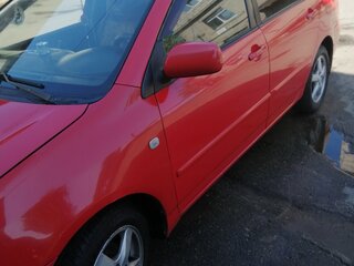 2006 Toyota Corolla IX (E120, E130) Рестайлинг, красный, 450000 рублей, вид 4