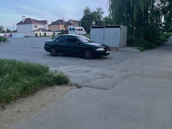 2000 Mitsubishi Carisma I Рестайлинг, зелёный, 247000 рублей - вид 6