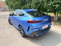 2021 BMW X6 30d III (G06), синий, 8500000 рублей - вид 6