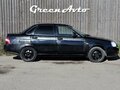 2010 Lada (ВАЗ) Priora Premier I, чёрный, 210000 рублей - вид 7
